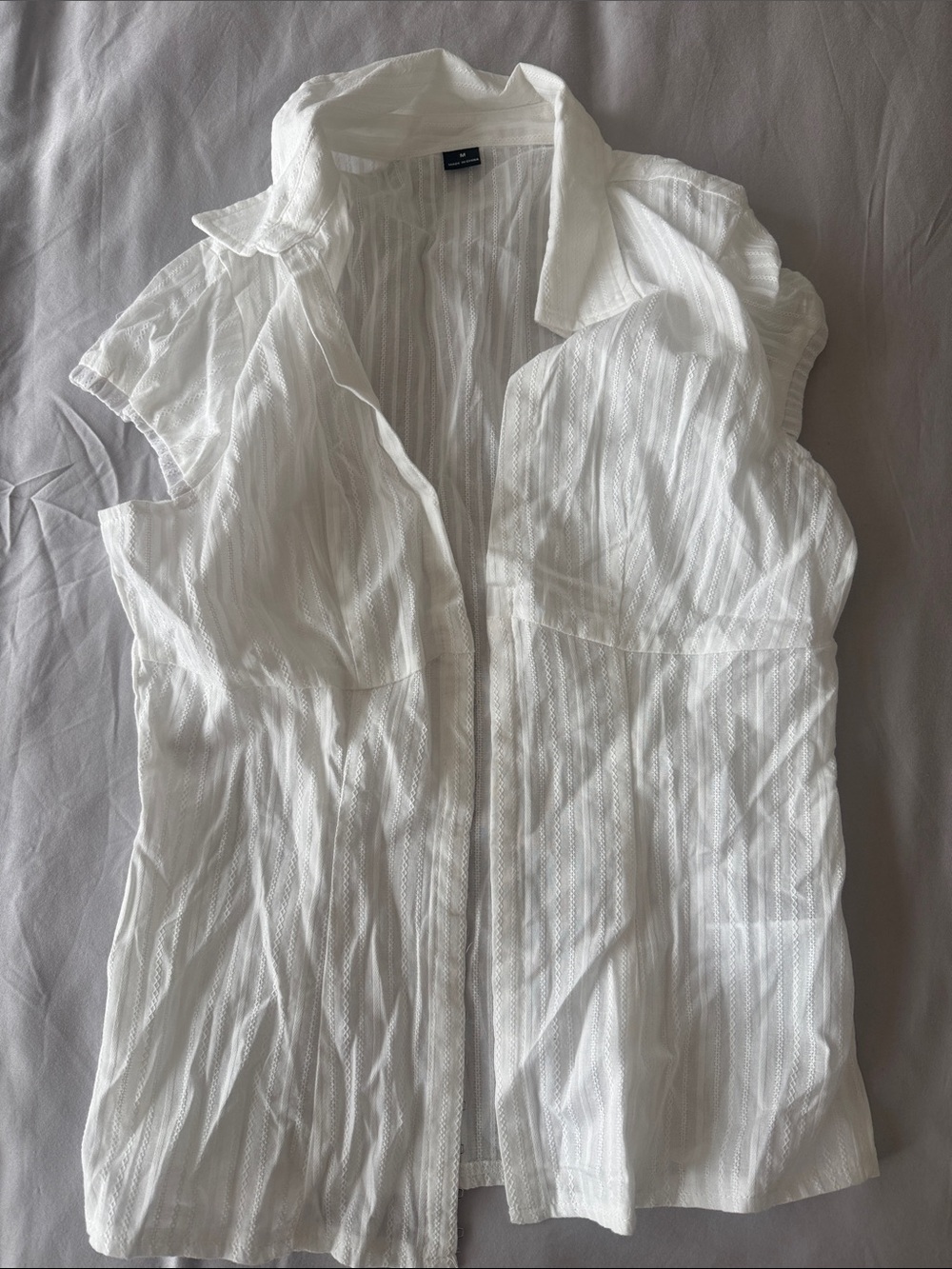 Women's White Sleeveless Button-Front Blouse
